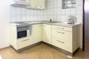 Fridge, microwave, coffee/tea maker, toaster