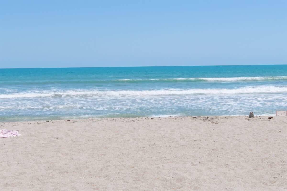 Solsenger og strandhåndklær