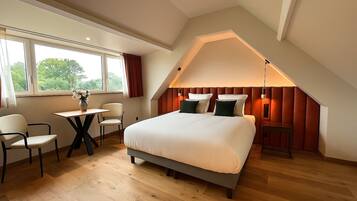 Suite junior, 1 cama de matrimonio grande, no fumadores, vistas al parque | Ropa de cama de alta calidad y colchones con acolchado adicional