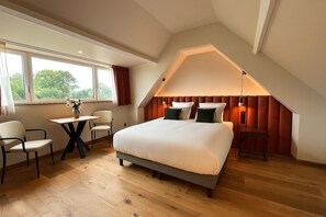 Premium bedding, pillow-top beds, free minibar, blackout curtains