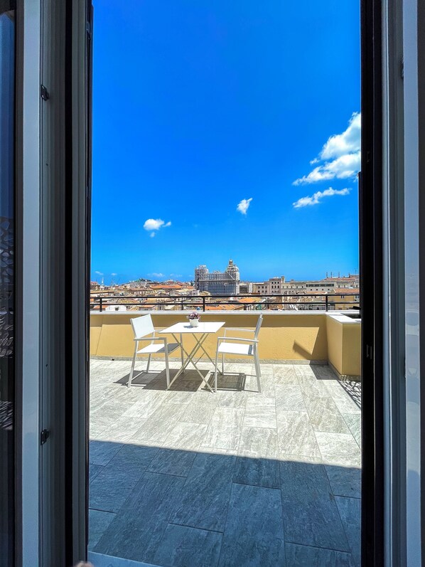 Quarto casal, vista para a cidade | Terraço/pátio