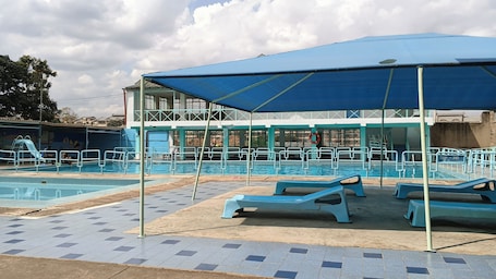 2 outdoor pools, open 9:00 AM to 6:00 PM, pool umbrellas, sun loungers