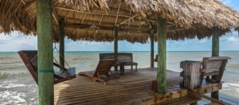 Tropical beachfront getaway with private pool, ocean views & enclosed yard