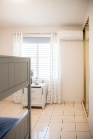 Blackout drapes, soundproofing, iron/ironing board, free WiFi