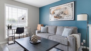 Apartment (1 Bedroom) | Living area | 50-inch TV with digital channels