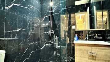 Hair dryer, towels, soap, shampoo