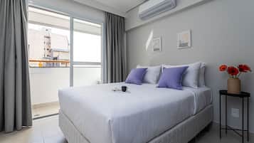 Appartement supérieur | Fer et planche à repasser, accès au Wi-Fi (inclus), literie fournie