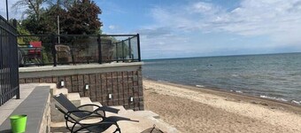 SANDY BEACHFRONT cottage with HOT TUB and FIRESTOVE