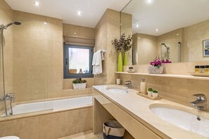Shower, hair dryer, towels