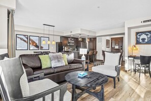 TV, fireplace - Bears Den 2BR Getaway with Hot Tub, BBQ and Near DT (Dead Man`s Flats)