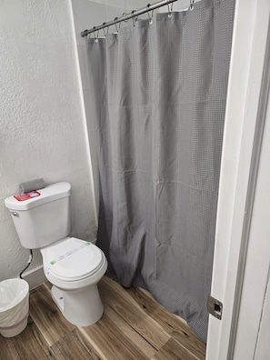 Shower, towels, soap, toilet paper