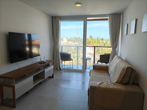 Basic Apartment | Living area - Apartments in a Condo With a Pool and Gym - AGA (Camaçari)