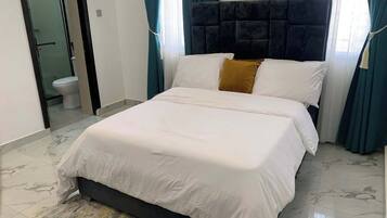 Economy Apartment, Balcony, City View | Desk, laptop workspace, blackout curtains, soundproofing