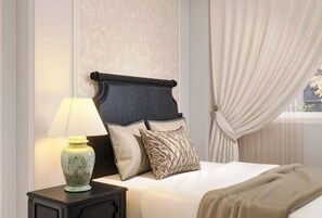 A neatly made bed with a dark headboard, a lamp on a bedside table, and a window with curtains. - Soho Premium Suites - Ben Thanh Market Area & SG's Heart (Ho Chi Minh City)