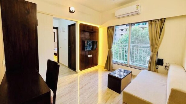 Living area - Executive 1BHK Suite | Near Link Road (Mumbai)