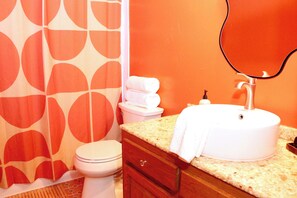 Shower, eco-friendly toiletries, hair dryer, towels