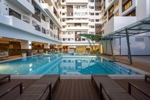 Outdoor pool - By Trixia BE Apartments, Luxury Studio Apartments near IT Park (Cebu City)