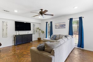 TV, fireplace, books, stereo