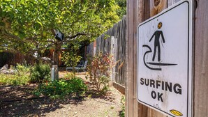 A sign indicating surfing is allowed. - Sleeps 8 in the Jewell Box close to Privates and Pleasure Point (Santa Cruz)