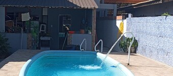 Townhouse with pool and air conditioning near Caraguatatuba shopping mall