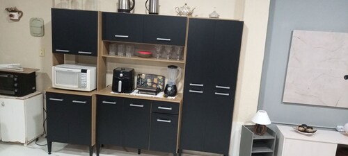 Townhouse with pool and air conditioning near Caraguatatuba shopping mall