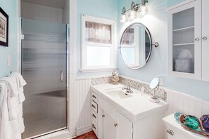 Shower, hair dryer, towels