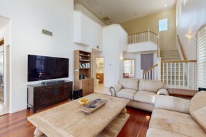 Smart TV, fireplace, books, stereo
