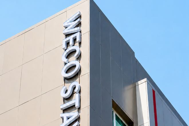 A building with a prominent sign reading 'WECO STUDIO'.
