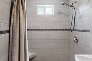 Shower, hair dryer, towels