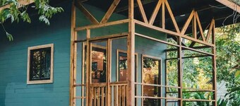 Surfside tiny home with modern amenities like AC, modern design, bathtub,and TV.