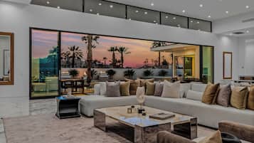 Villa 15 | Living area | 50-inch Smart TV with cable channels