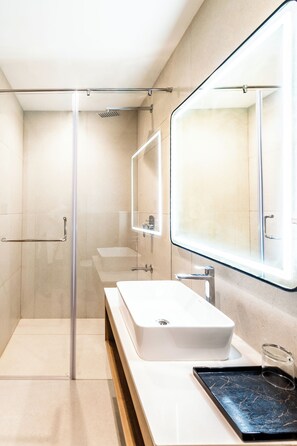 Shower, towels, soap, shampoo