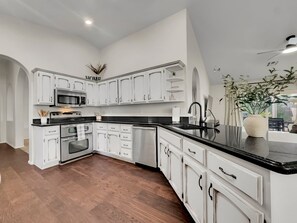 Casa, varias camas, acceso a la alberca, vista al jardín (Nacoma Sun Lakes) | Cocina privada