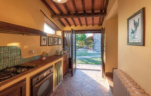 Fridge, stovetop, coffee/tea maker