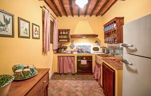 Fridge, stovetop, coffee/tea maker