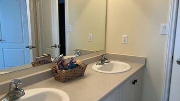 Hair dryer, towels, soap, toilet paper