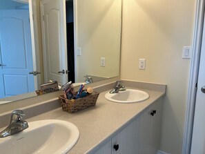 Hair dryer, towels, soap, toilet paper