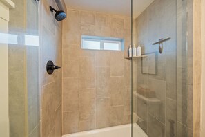 Shower, hair dryer, towels, soap
