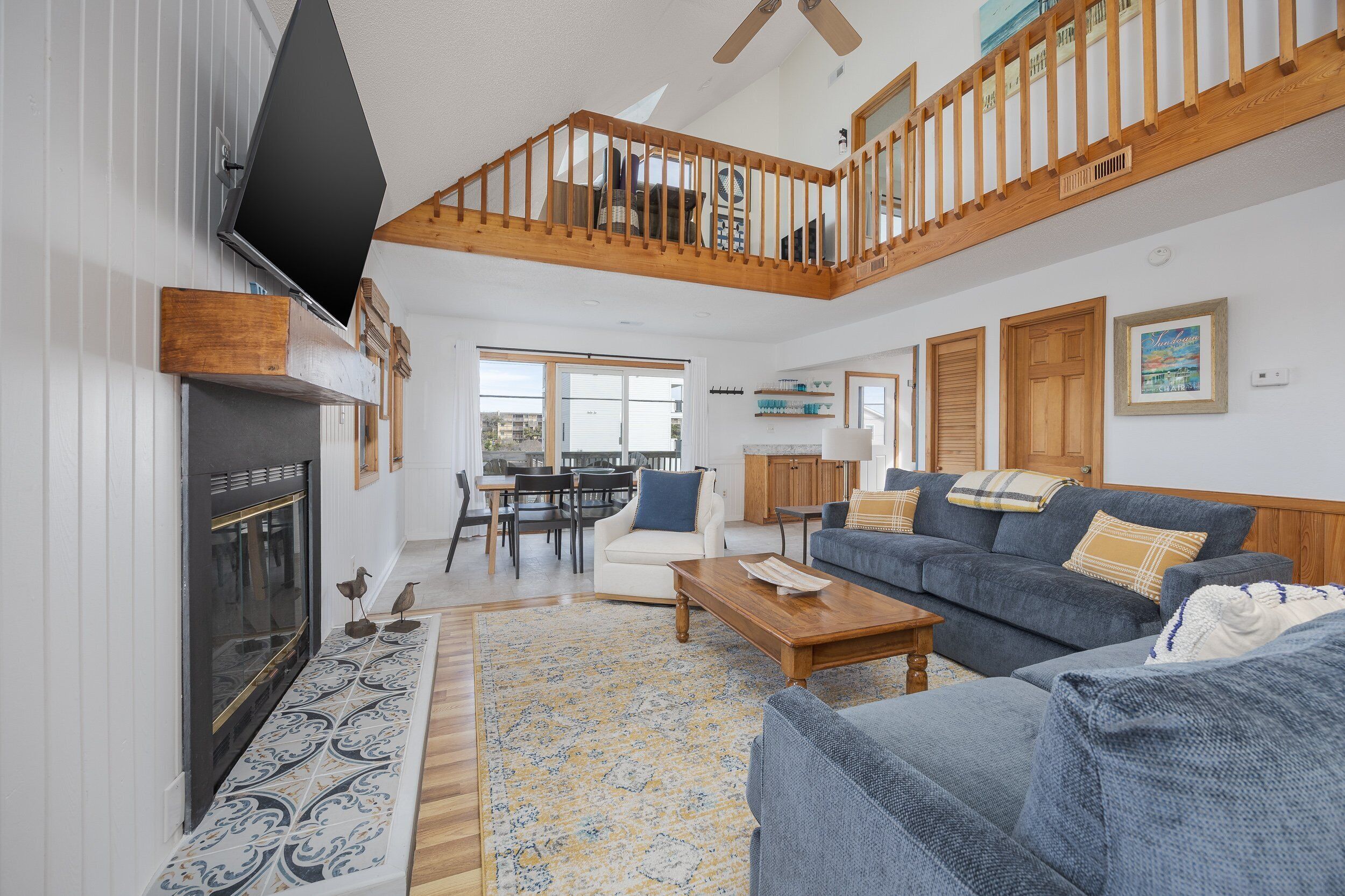 TV, fireplace, books