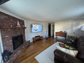 TV, fireplace - Cape Escape: Relax, HotTub, Deck & Beaches Nearby (Yarmouth)