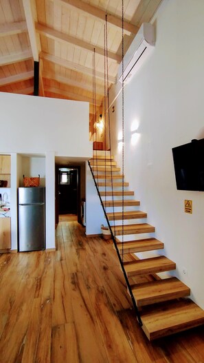 Luxury Suite, Balcony, City View | Living area | 43-inch Smart TV with digital channels, Netflix, streaming services