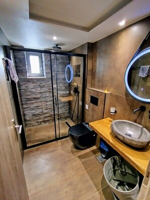 Luxury Suite, Balcony, City View | Bathroom | Deep soaking tub, free toiletries, hair dryer, towels