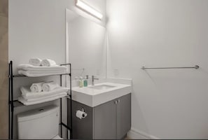 Hair dryer, towels, soap, shampoo