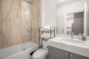 Hair dryer, towels, soap, shampoo