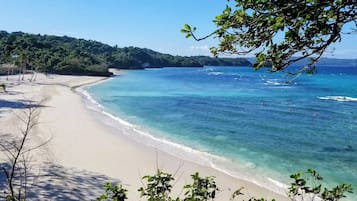 Private beach, white sand, free beach cabanas, sun loungers
