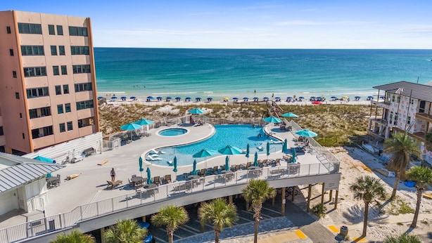 A resort with a large pool, beach access, and a view of the ocean. - 🌅 Chasing Sunsets | Harbor + Gulf Views | FREE Parasailing ☀️ (Destin)