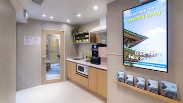 Mini-fridge, microwave, cookware/dishes/utensils