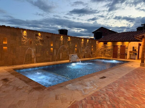 Outdoor pool, free cabanas, pool umbrellas