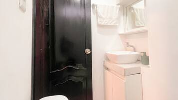 Shower, towels, soap, toilet paper