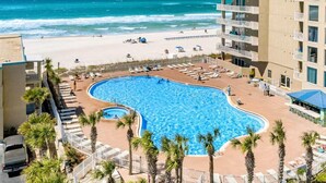 A hotel with a swimming pool, beach access, and a view of the ocean. - Tidewater 3006 (Panama City Beach)